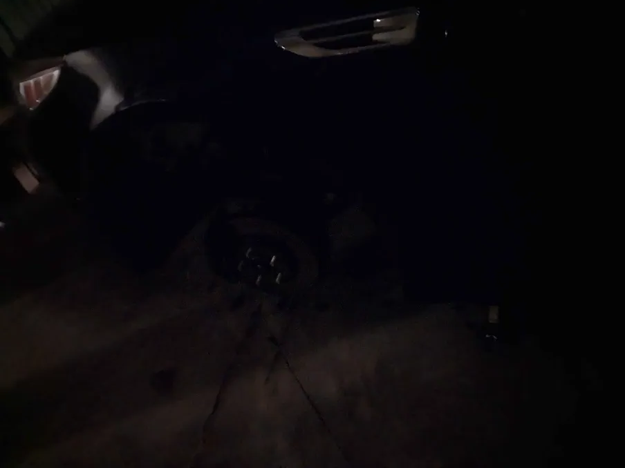 Car with tire removed